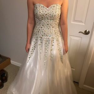 Henri’s cloud nine wow prom white beaded dress.
